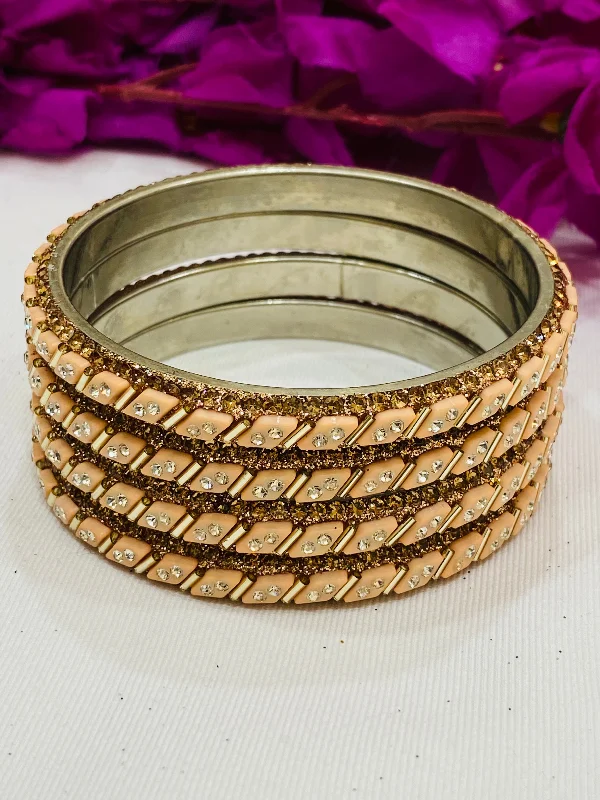 Handmade Diamond Bangles-Appealing Peach Color Metal Bangles With Glitter Stone Work For Women