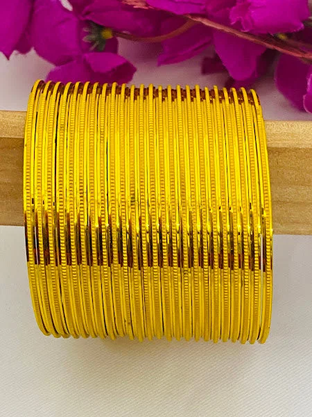 Wedding Bangles for Bridesmaids-Appealing Yellow Color Plain Metal Bangles