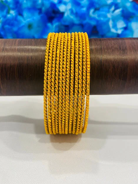 Elegant Stacked Bangles-Fascinating Yellow Color Antique Gold Bangles With Plain Running Dots