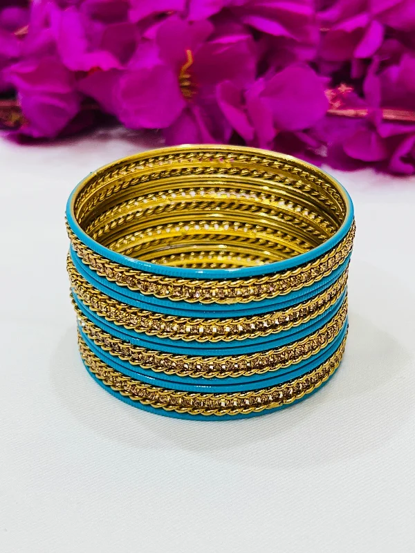 Round Shaped Bangles-Lovely Sky Blue Color Metal Bangles With Gold Spiral Design For Women