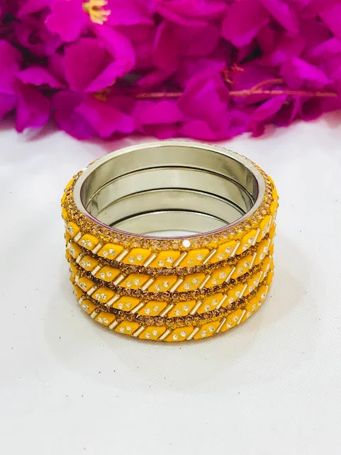 Engraved Gold Bangles-Dazzling Yellow Colored Metal Bangles For Girls