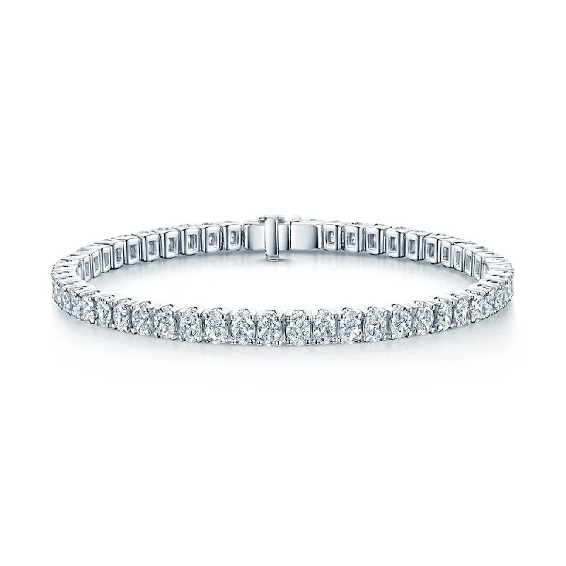 Modern Leather Bracelets-Platinum Claw Set Oval Cut Diamond Tennis Bracelet