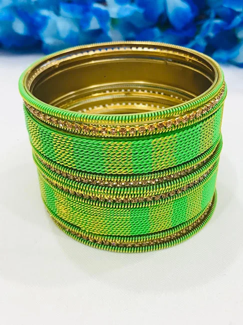 Round Gold Bangles-Attractive Green Colored Spiral Designed Metal Bangles For Women